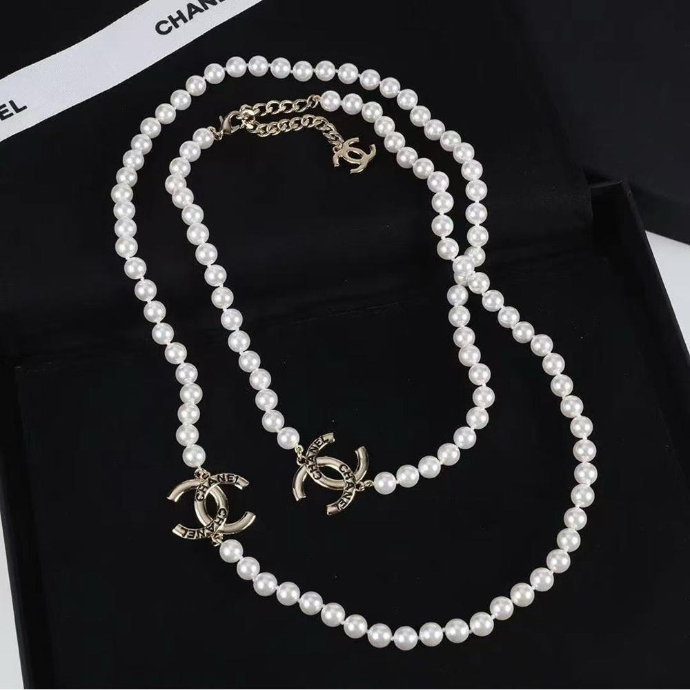 CHANEL Pearl Necklace with Gold Accents